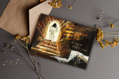 Easter greeting card with empty tomb illustration and 'The Lord is Risen' text.