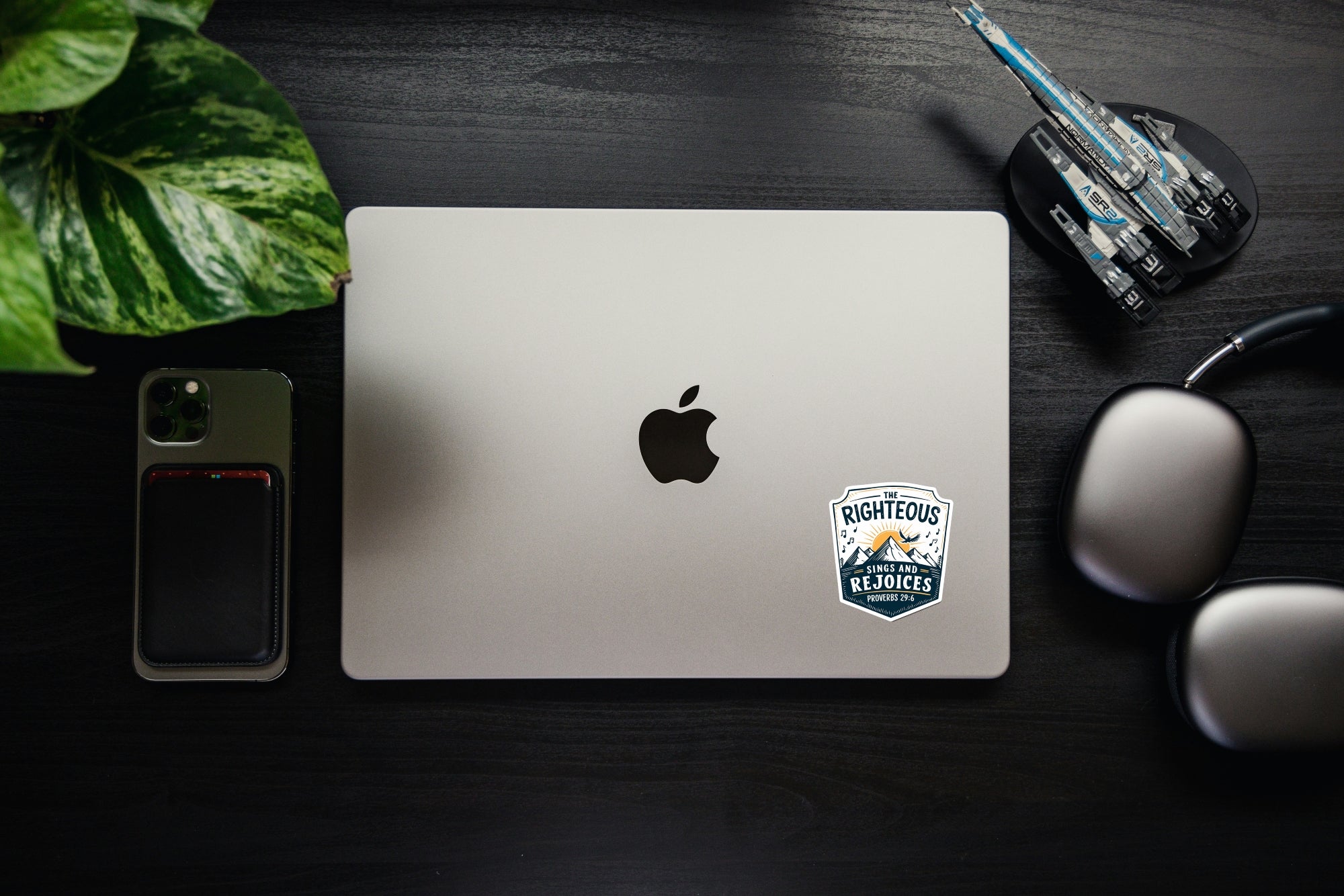 Small shield sticker on laptop, “Righteous Sings and Rejoices,” Proverbs 29:6