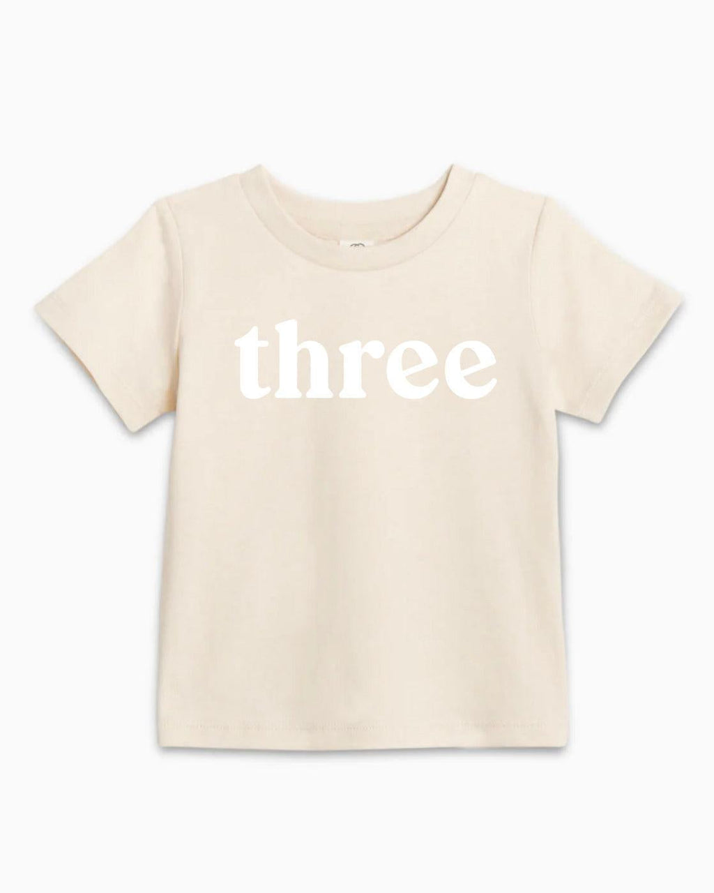 Kids organic cotton T-shirt in light cream with white 'three' text on front
