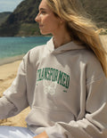 Light grey unisex hoodie with front logo graphic and kangaroo pocket, hood back view
