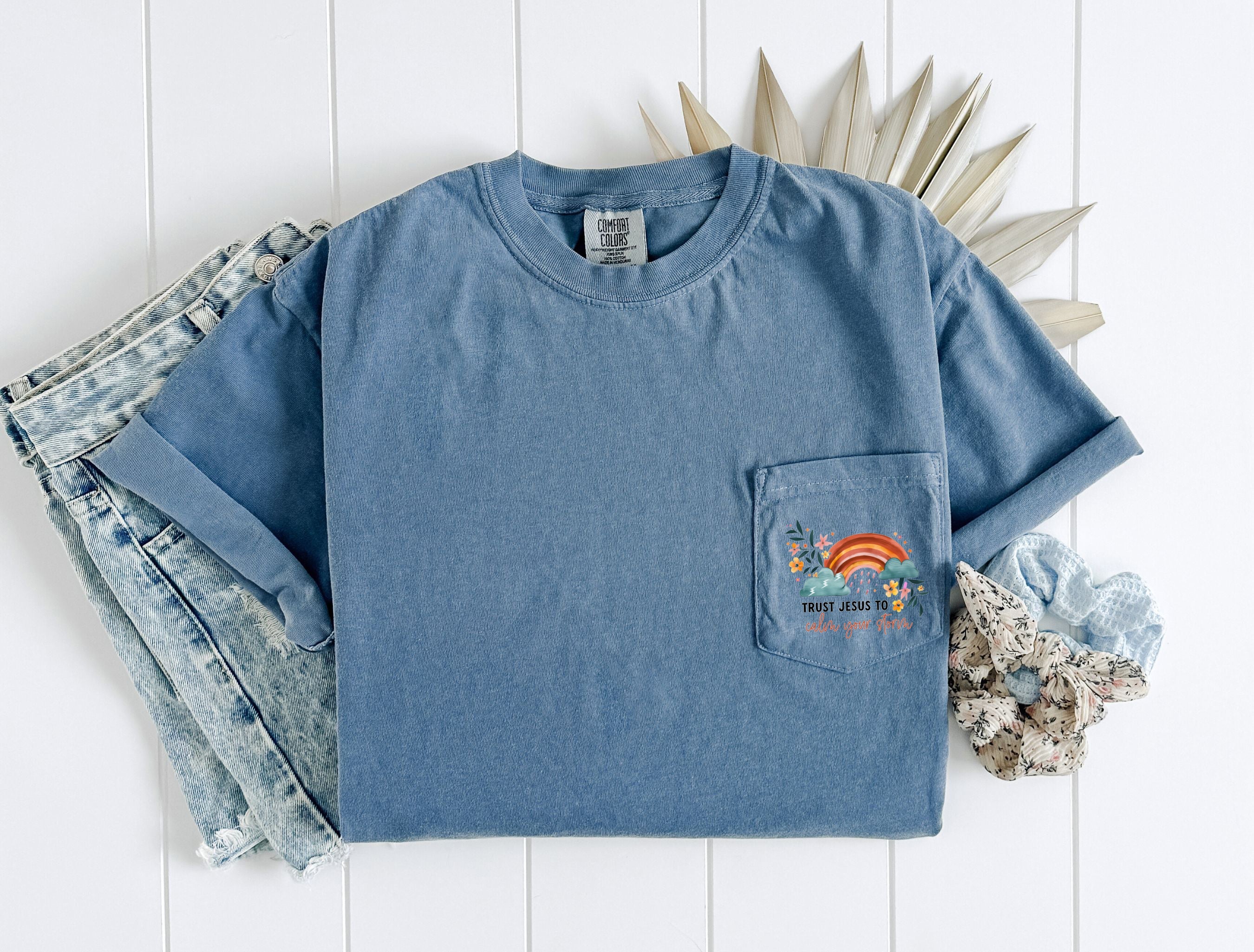 Blue pocket T-shirt with small logo print on chest pocket