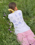 Light lavender unisex T-shirt, back print with flower symbols and text