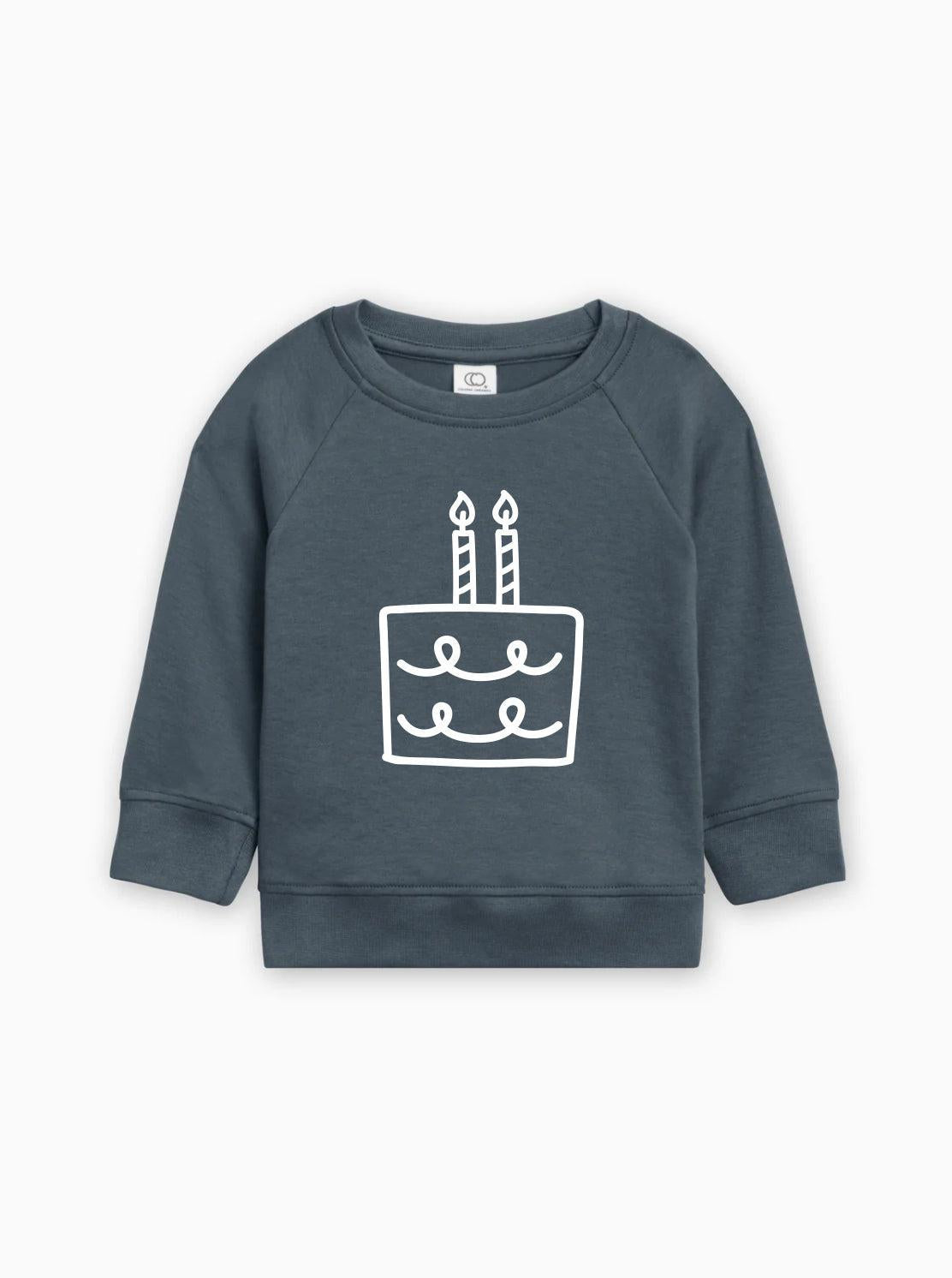 Navy baby pullover sweatshirt with birthday cake graphic on front