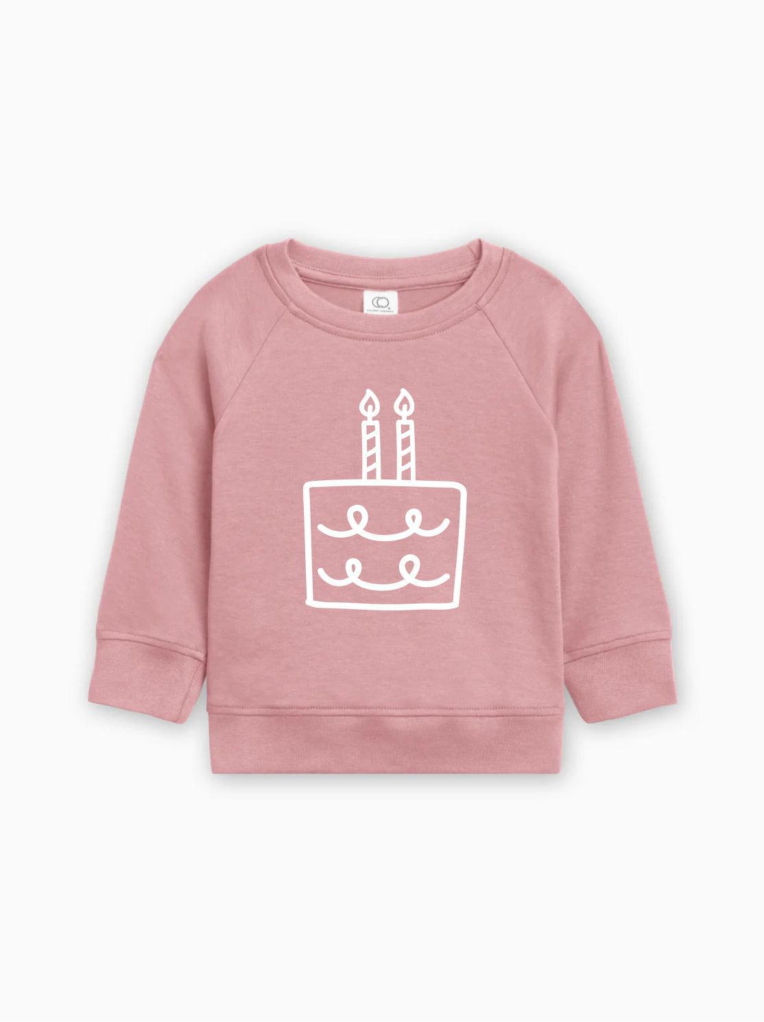 Dusty rose baby pullover sweatshirt with birthday cake graphic on front