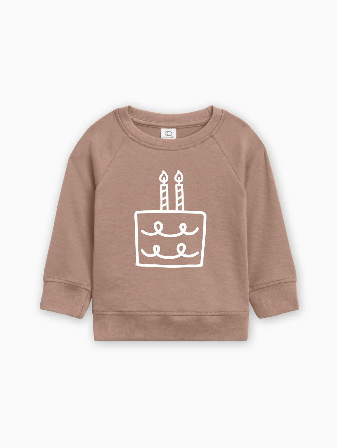 Brown baby pullover sweatshirt with birthday cake graphic on front