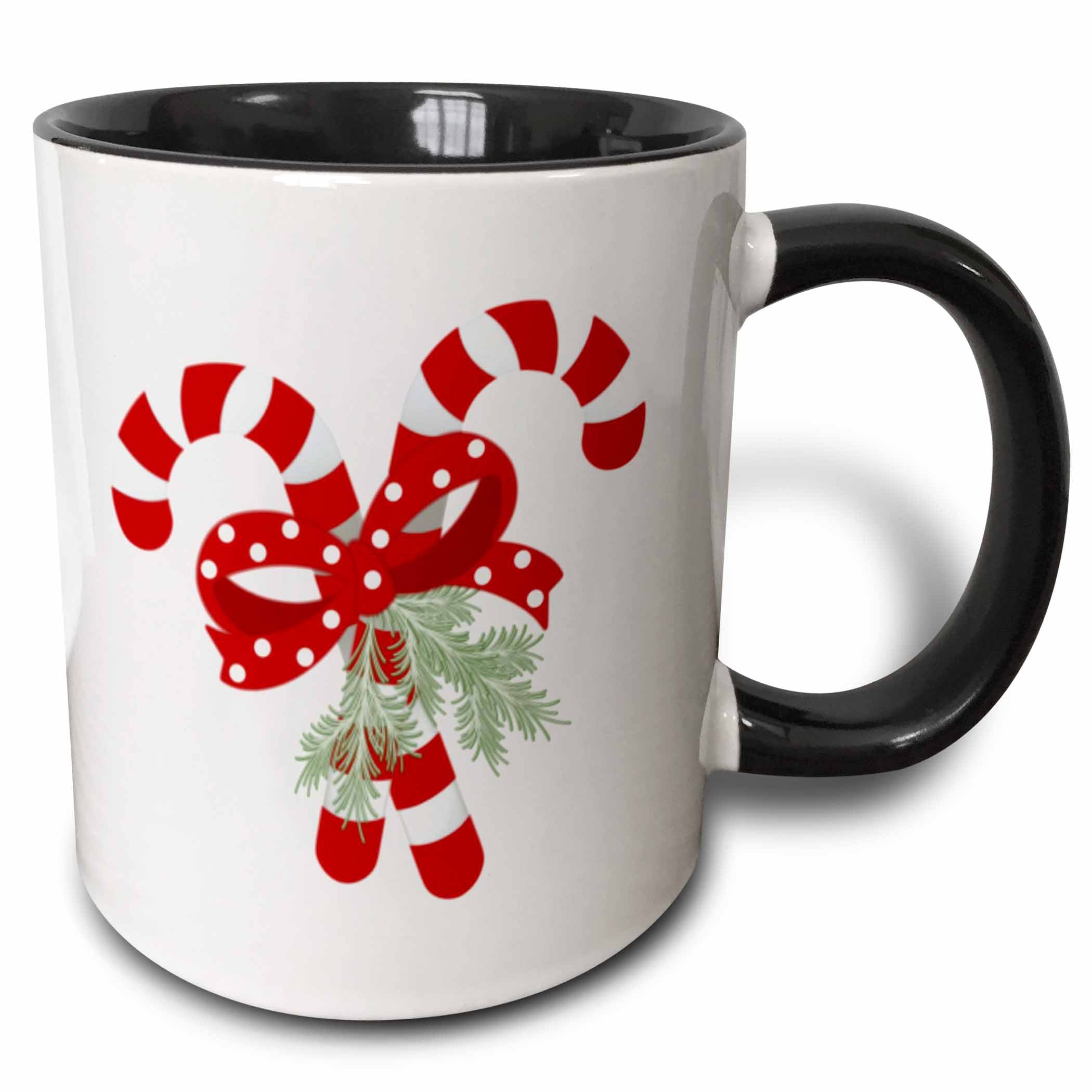 Black two-tone ceramic mug with crossed peppermint candy cane holiday graphic and pine sprig