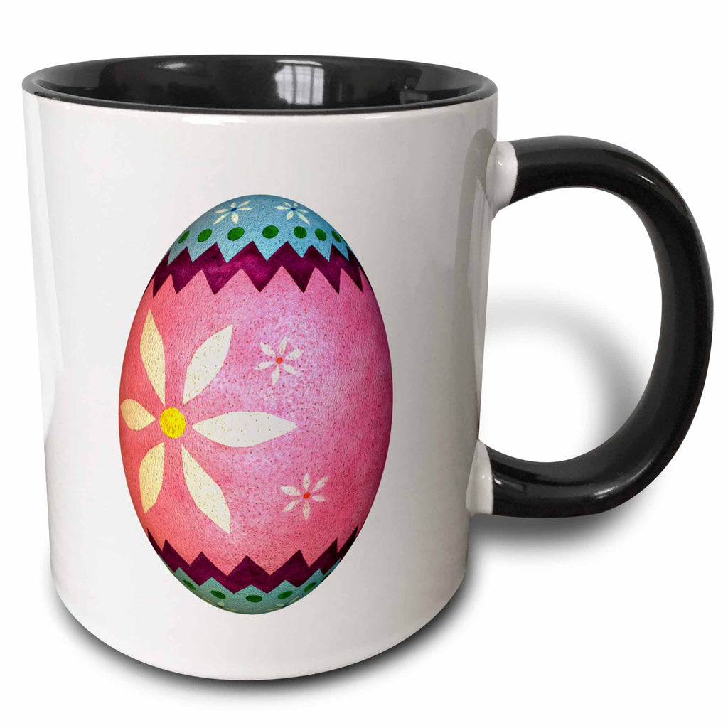 Two-tone black handle mug with pink Easter egg graphic and white body
