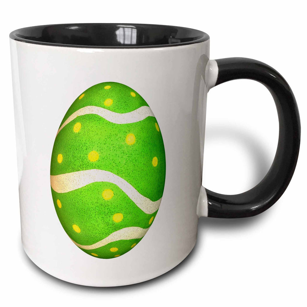 Two-tone black and white ceramic mug with green Easter egg graphic