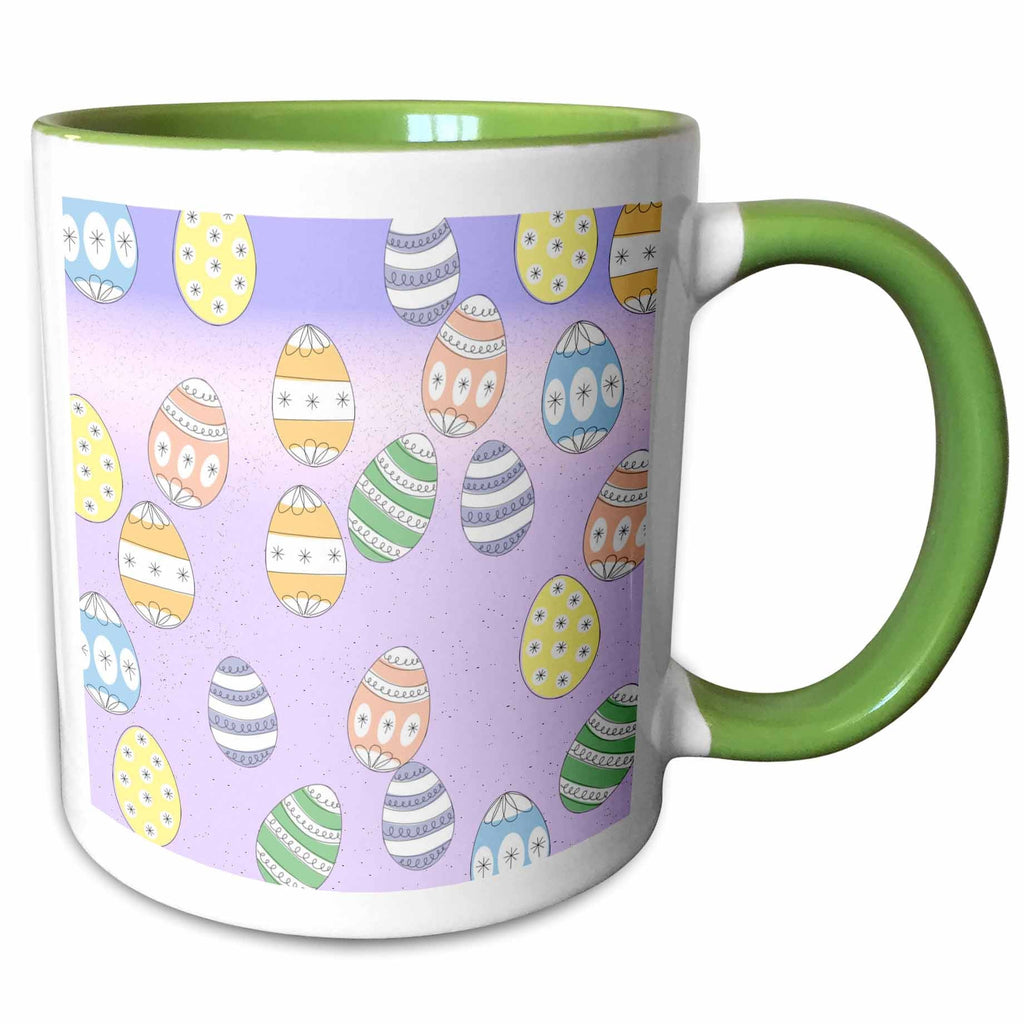 Easter egg pattern mug with green rim and handle, white body and purple background