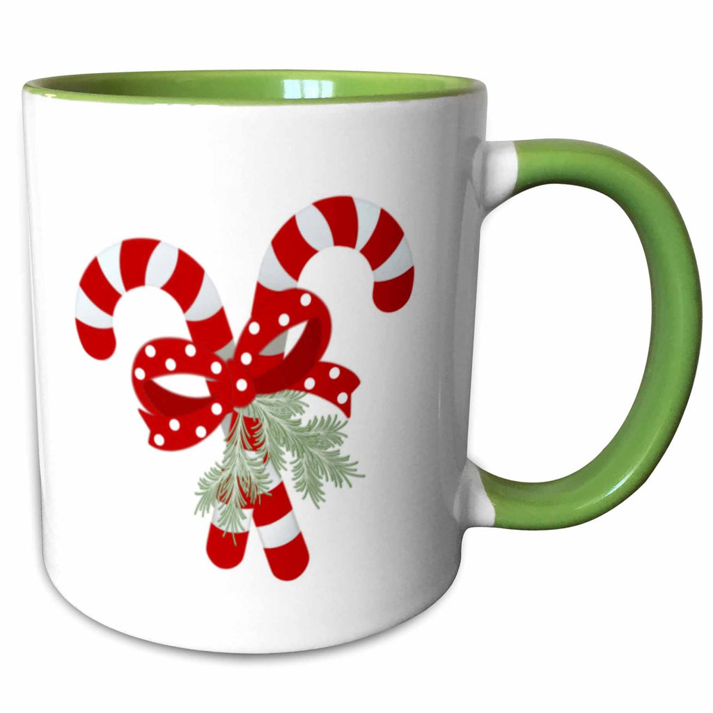 Green two-tone ceramic mug with crossed peppermint candy cane graphic and pine sprig