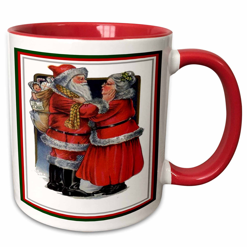 White mug with red interior and red handle, featuring Santa and Mrs Claus graphic