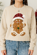 Cream long-sleeve sweatshirt with gingerbread man faux yarn patch and bow tie