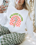 White long-sleeve sweatshirt with colorful festive skeleton graphic front