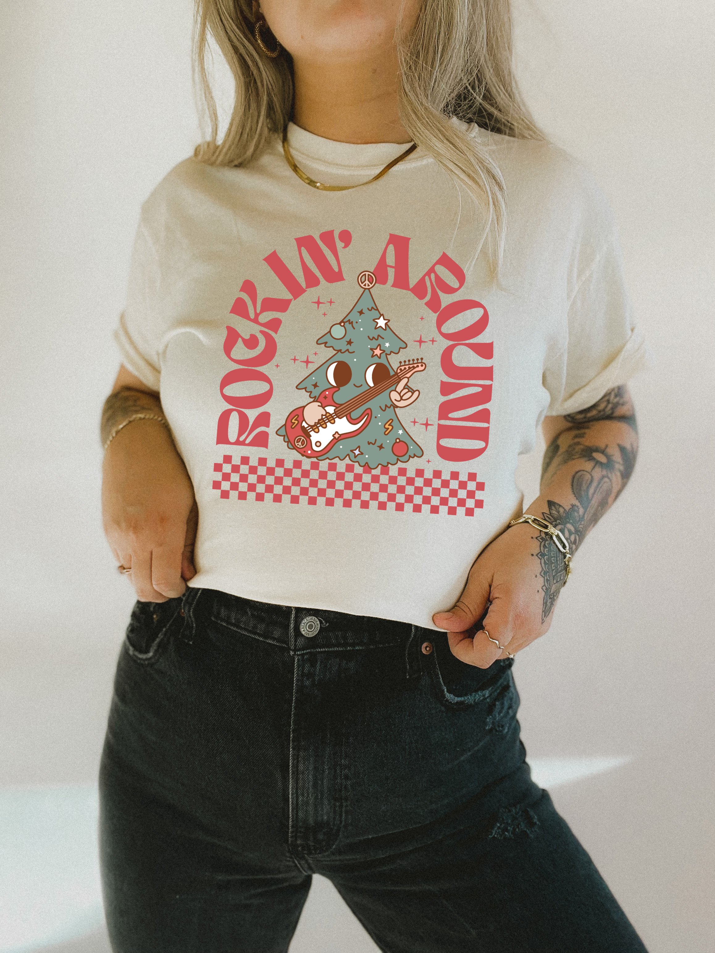 Retro holiday graphic tee, white with red tree and marching reindeer print