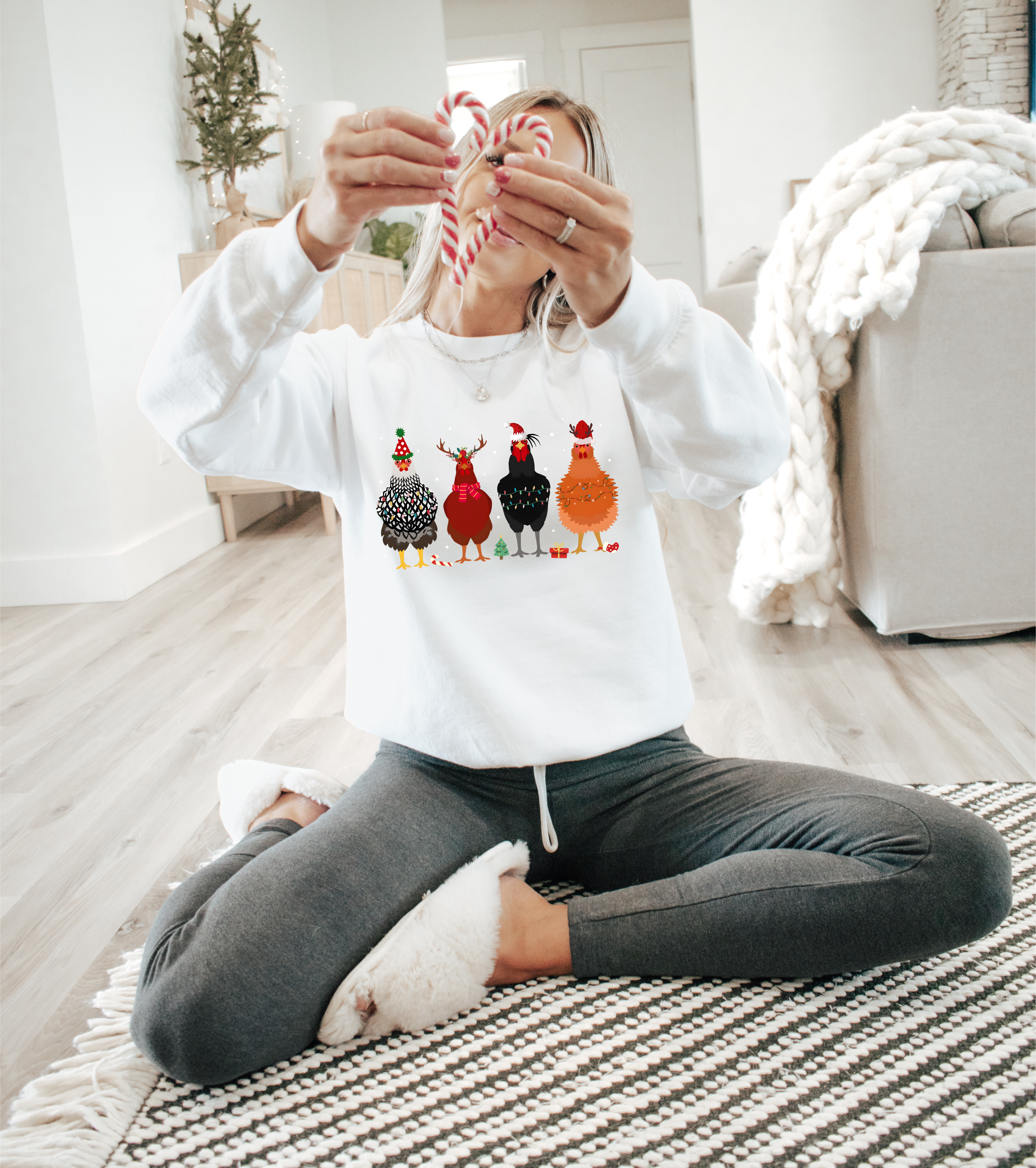 White crewneck Christmas chicken graphic sweatshirt with candy-cane print