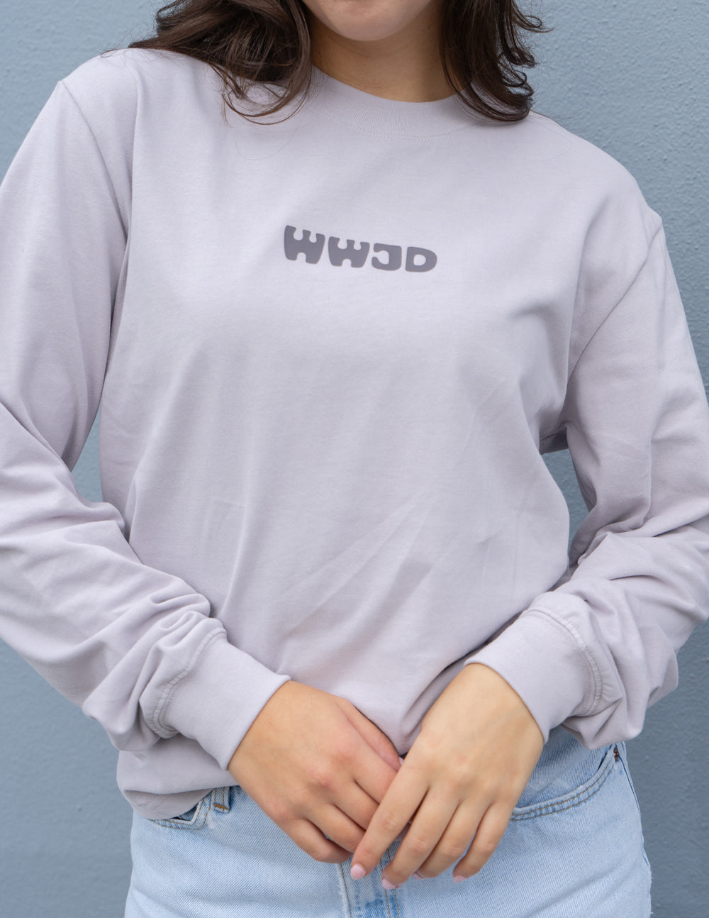 Unisex long-sleeve T-shirt, lavender with small WWJD logo on chest