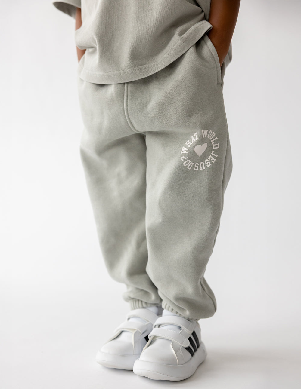 Light gray kids sweatpants with side heart logo print and ankle cuff gathers
