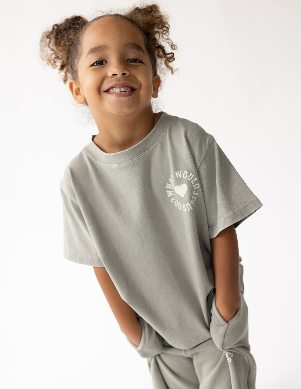 Kids varsity tee in heather gray with front chest logo and heart