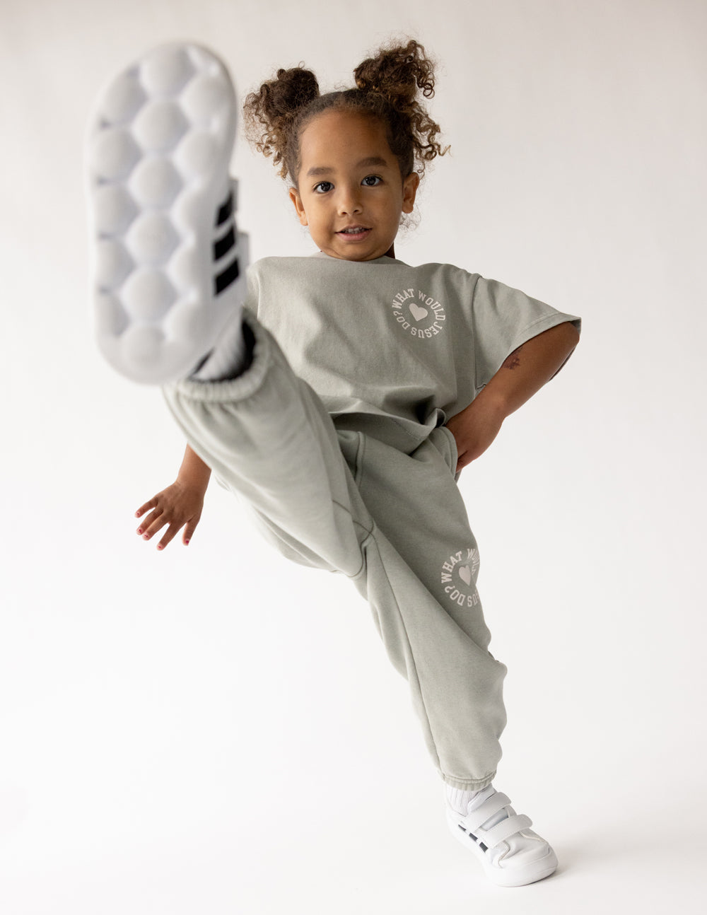 Kids varsity tee in heather gray with front logo and heart; crew neck short sleeves