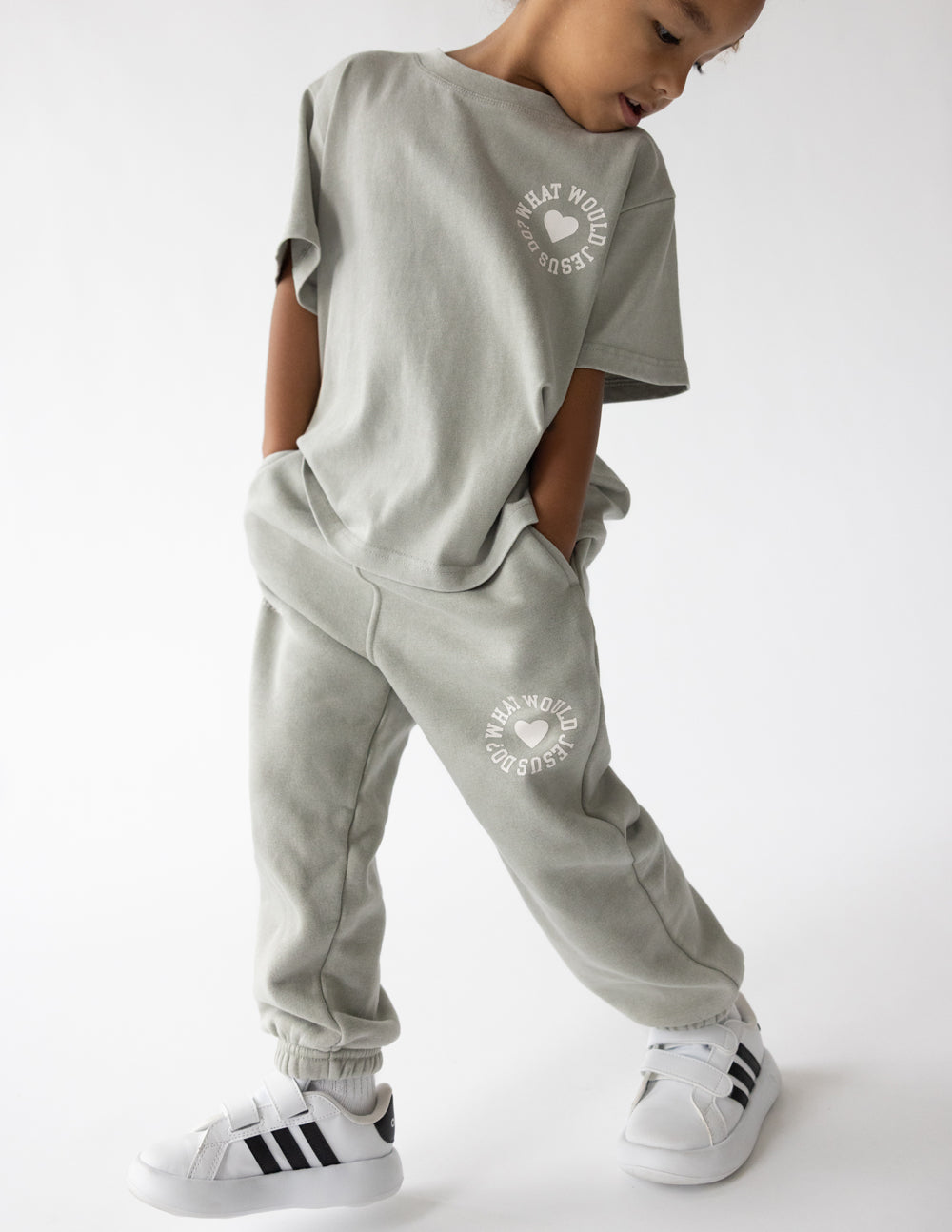 Kids varsity tee in heather gray with front chest logo; crew neck short sleeves