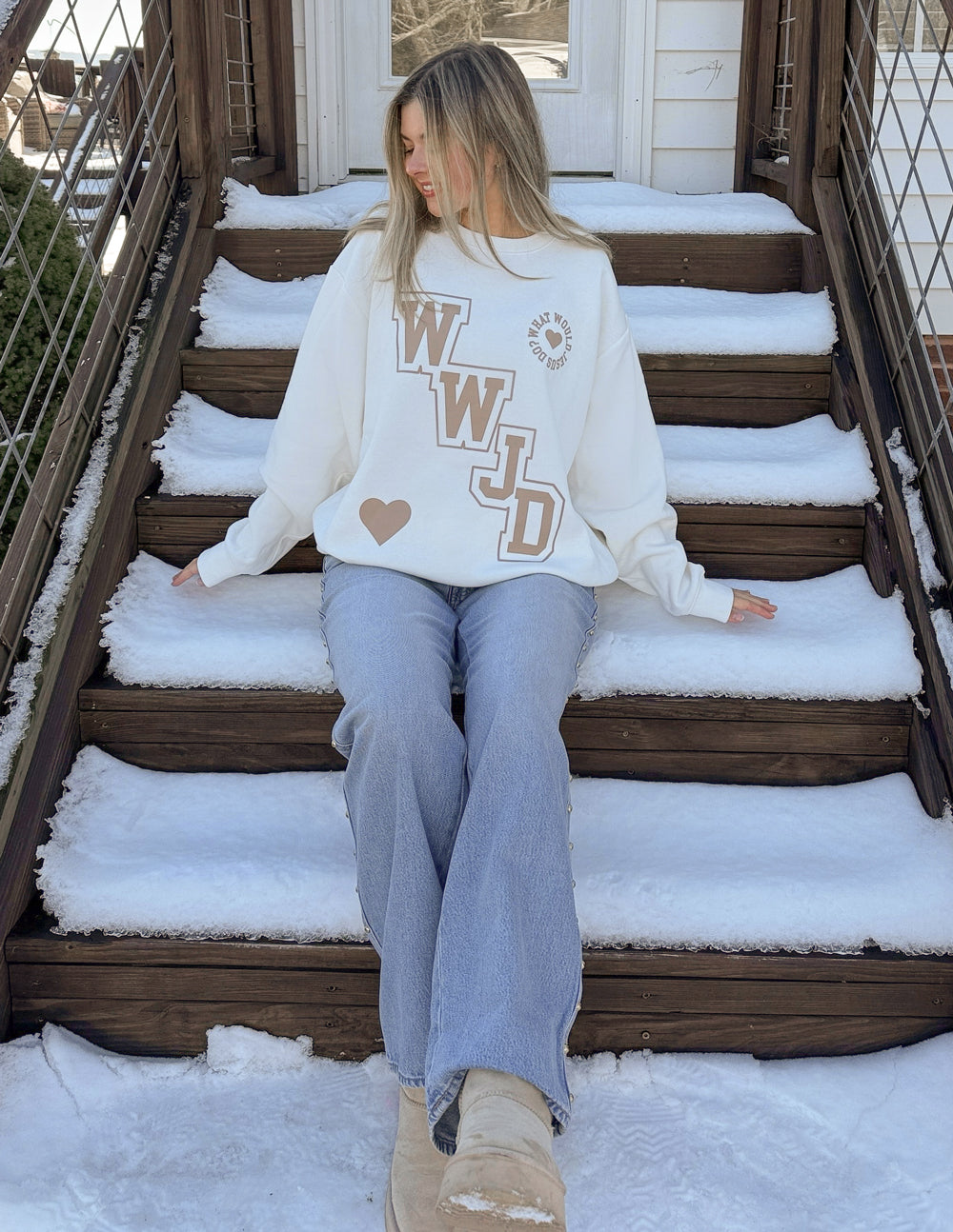 Off-white unisex crewneck sweatshirt with WWJD varsity logo on back