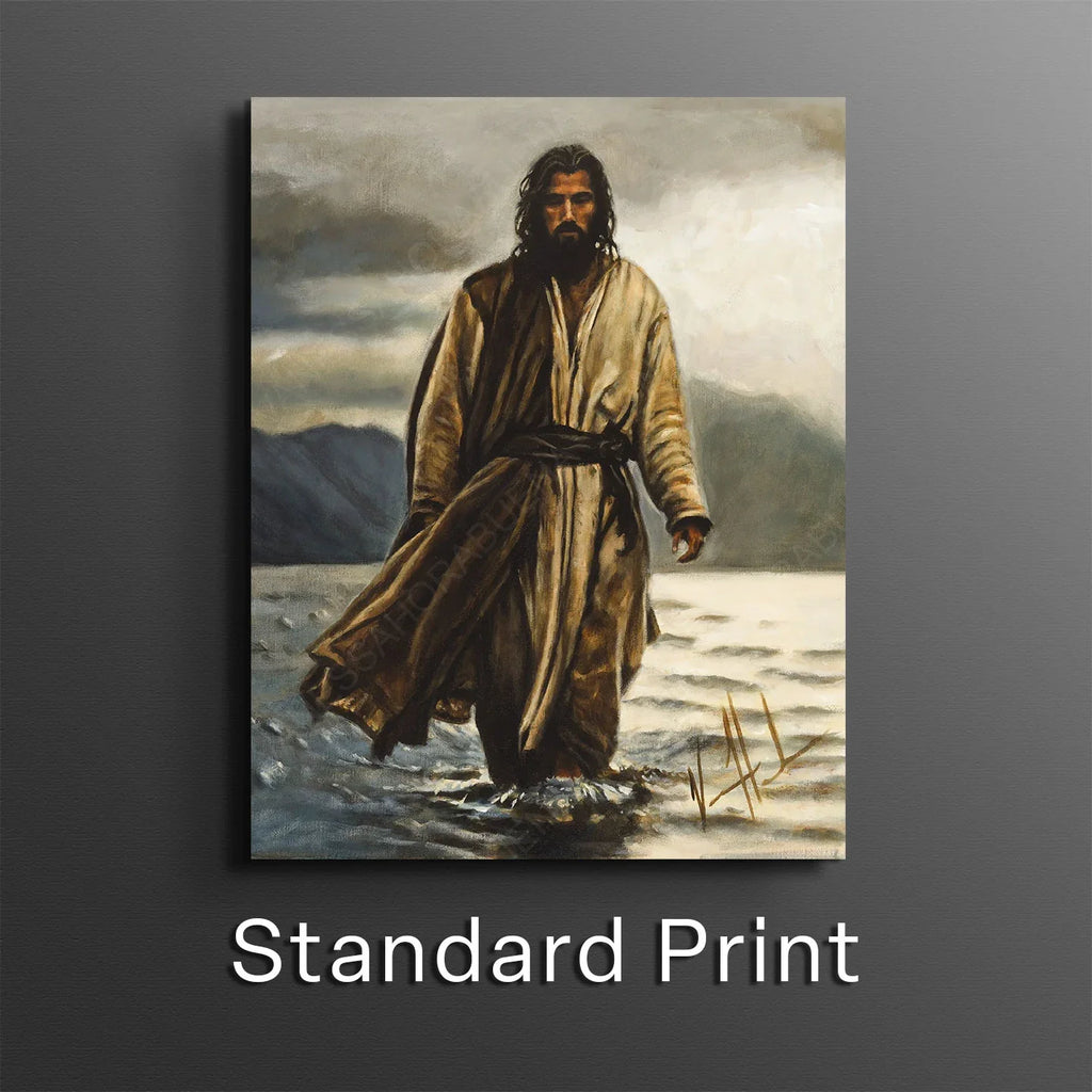 Framed wall art print of a robed man walking across a sandy landscape
