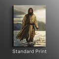 Framed wall art print of a robed man walking across a sandy landscape