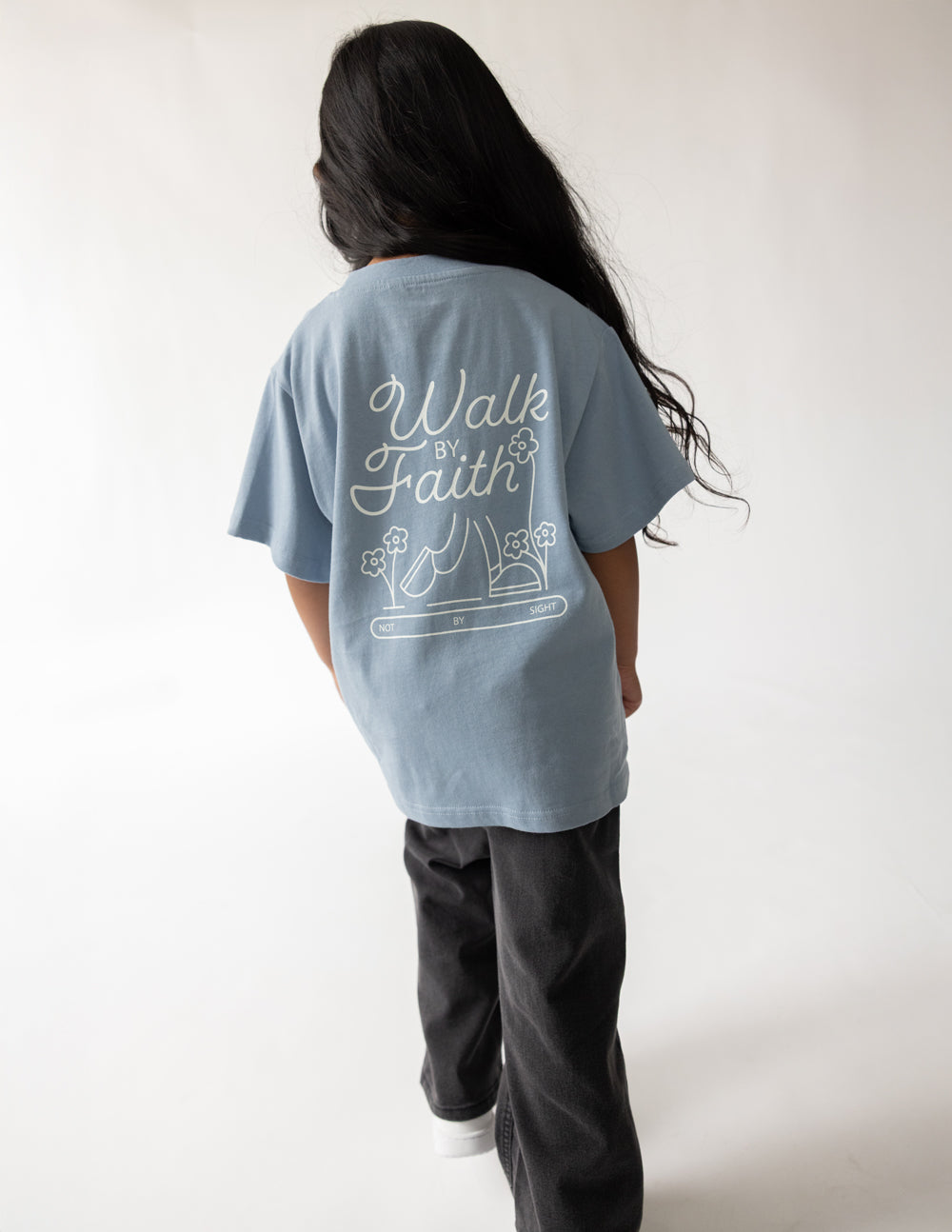 Light blue kids T-shirt with large back "Walk by Faith" script graphic