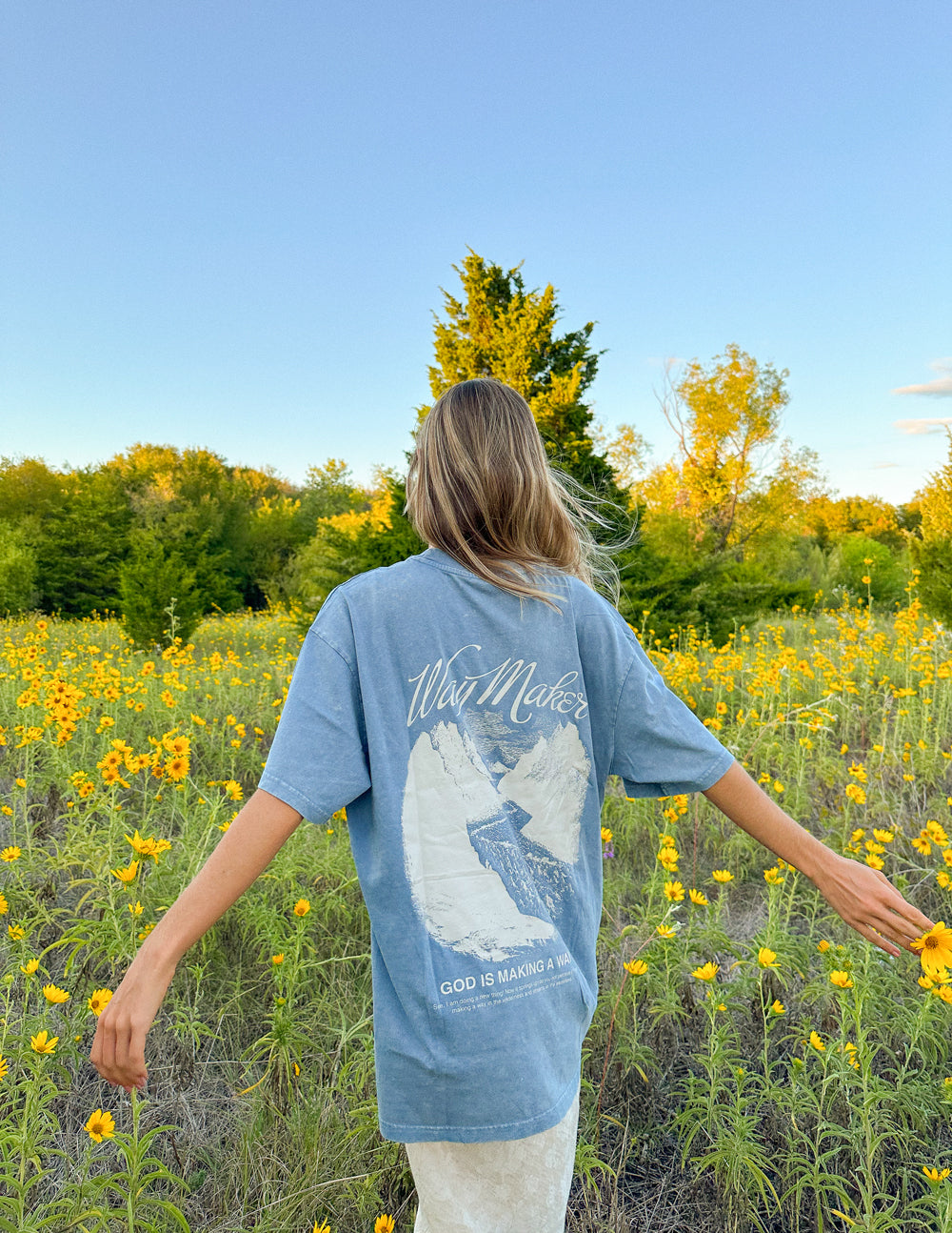 Unisex blue Way Maker T-shirt with large back mountain graphic, short sleeves.