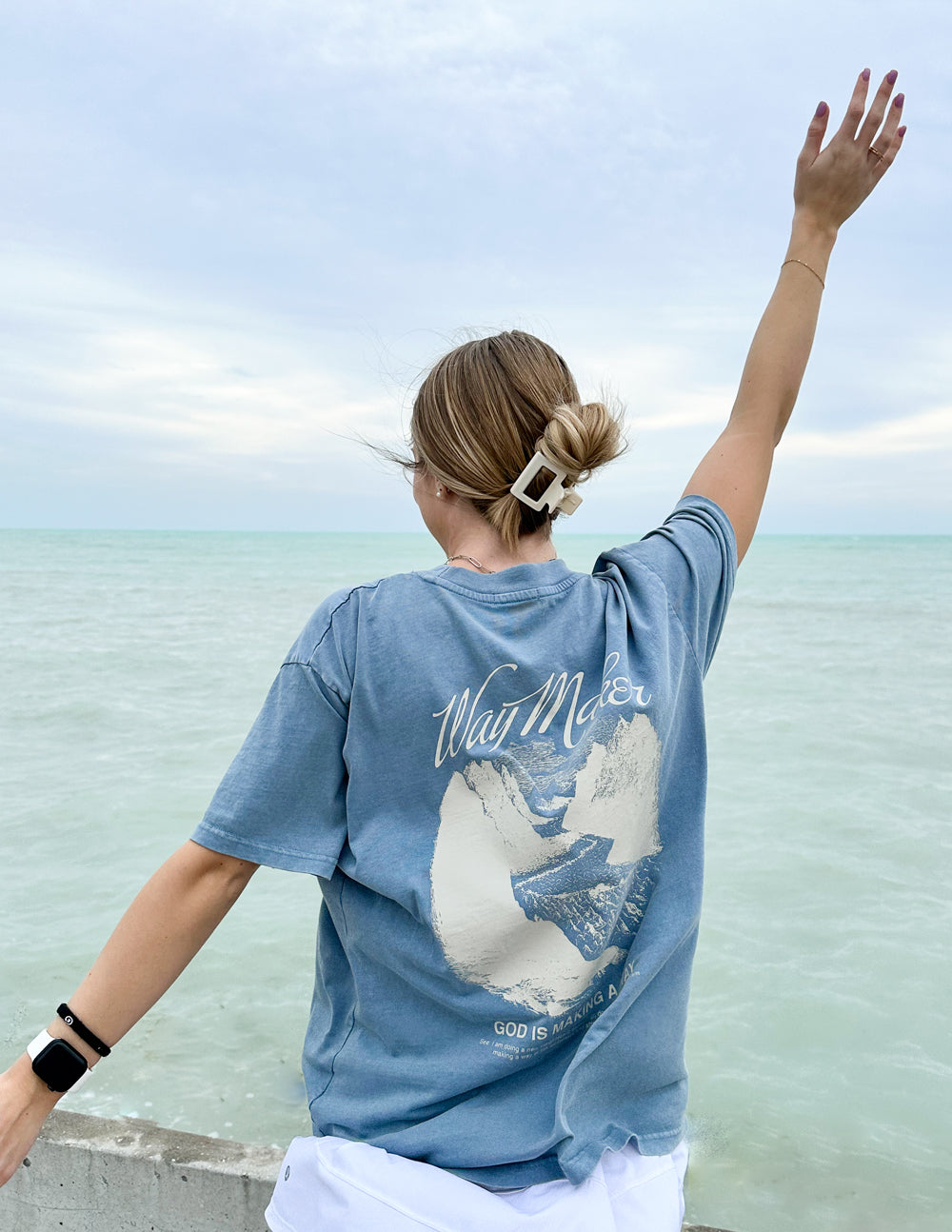 Unisex blue Way Maker T-shirt with back mountain graphic, short sleeves, loose fit.