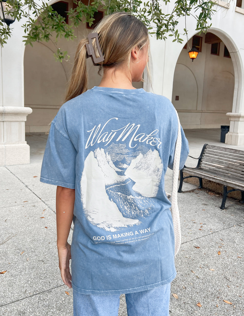 Blue unisex T-shirt showing back graphic with Way Maker text and large artwork