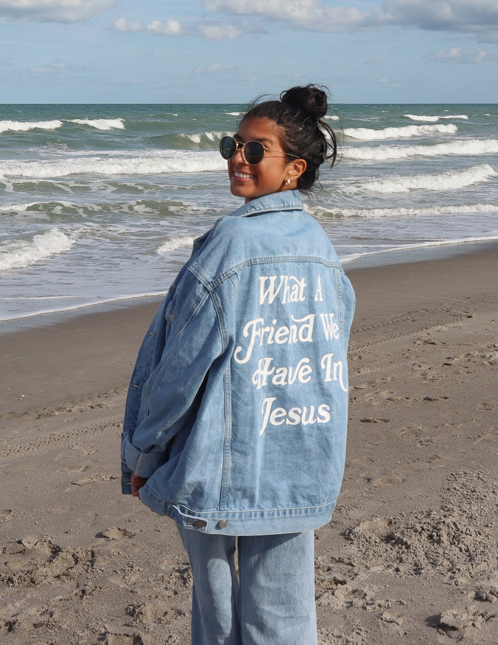 Light blue denim jacket with 'What A Friend We Have In Jesus' back graphic and full sleeves