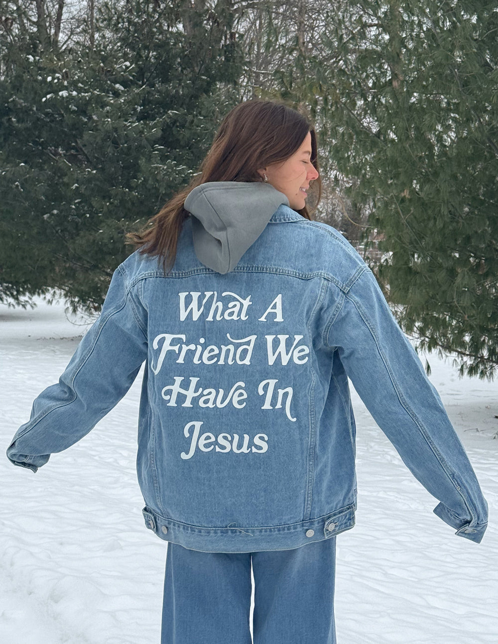 Light blue denim jacket with 'What A Friend We Have In Jesus' back graphic and long sleeves