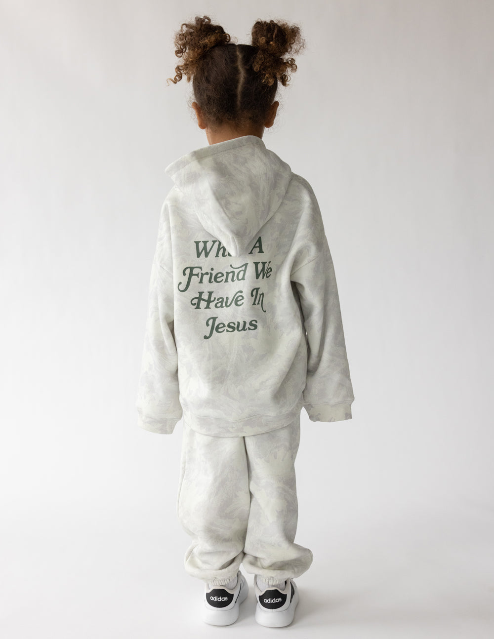 Kids pullover hoodie in light gray, back graphic text “What A Friend We Have In Jesus”.