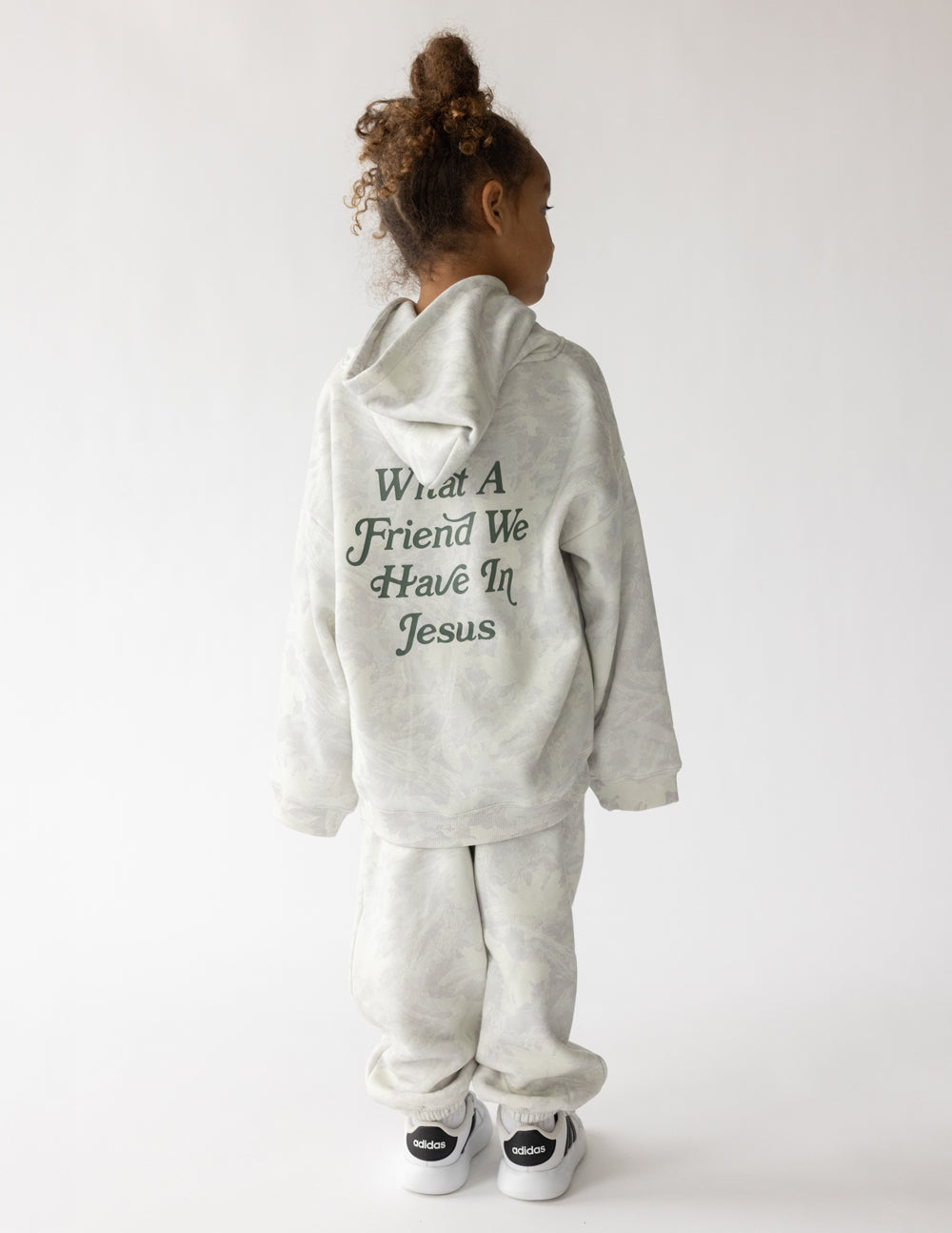 Kids pullover hoodie in light gray with hood; back shows “What A Friend We Have In Jesus”.