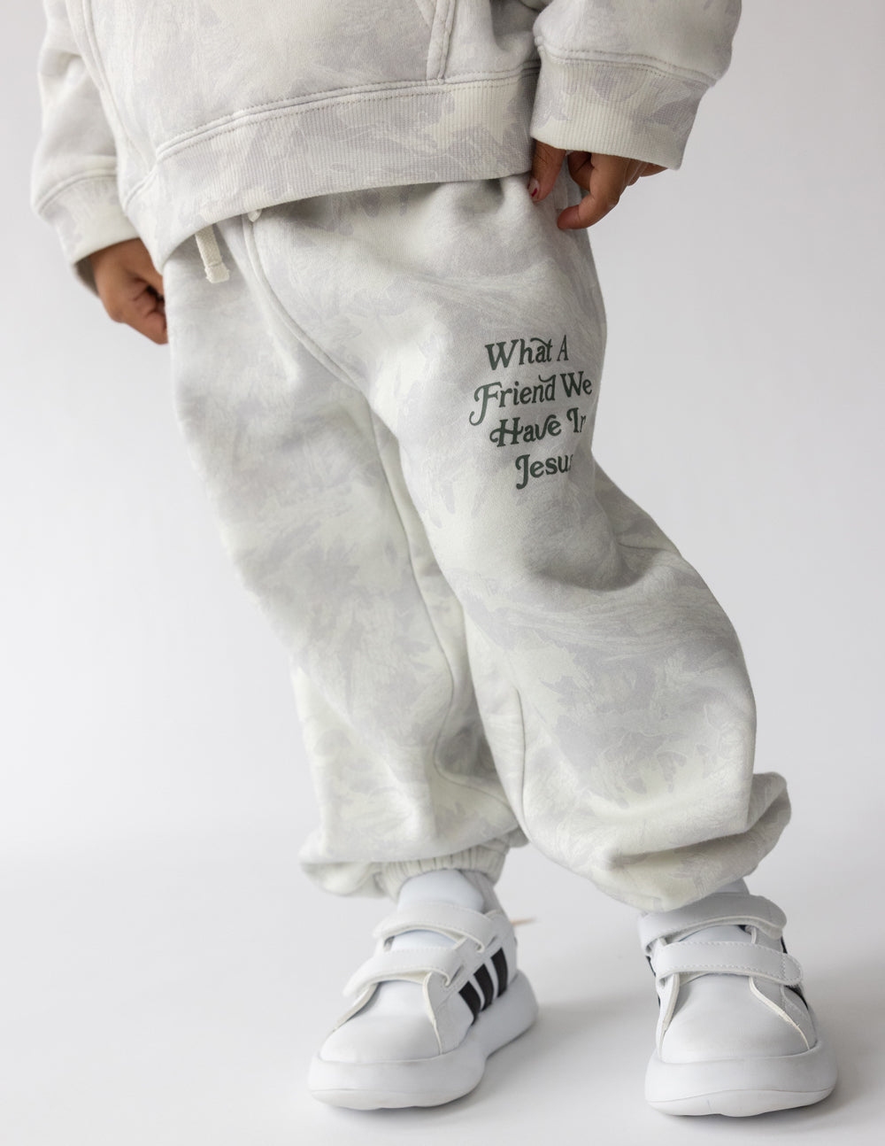 Kids sweatpants with 'What A Friend We Have In Jesus' logo on the leg