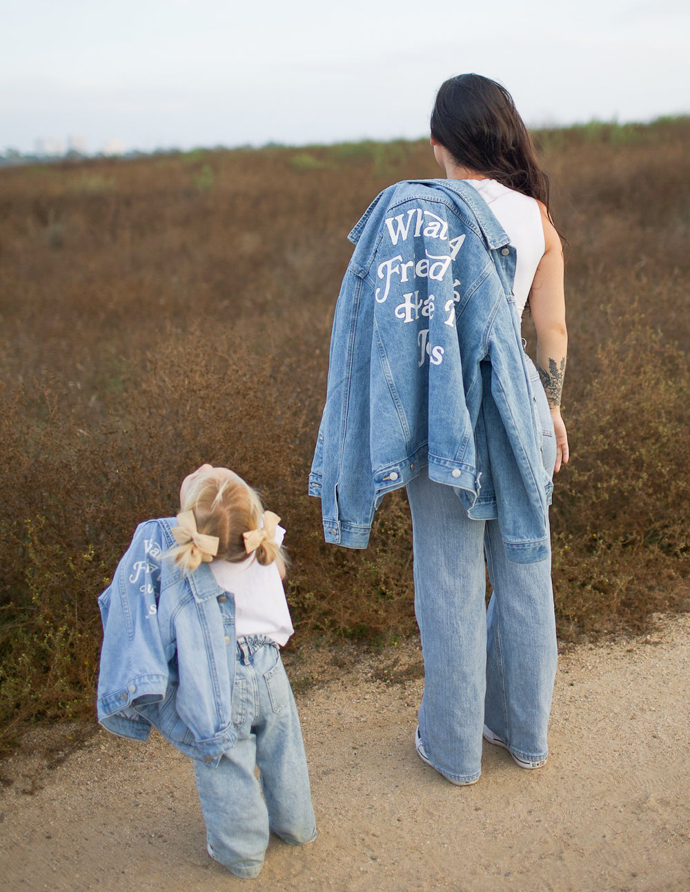 Kids light-wash denim jackets with back inspirational text print, mentioning Jesus