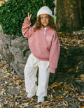 Kids mauve half-zip sweatshirt with stand collar and embroidered chest text