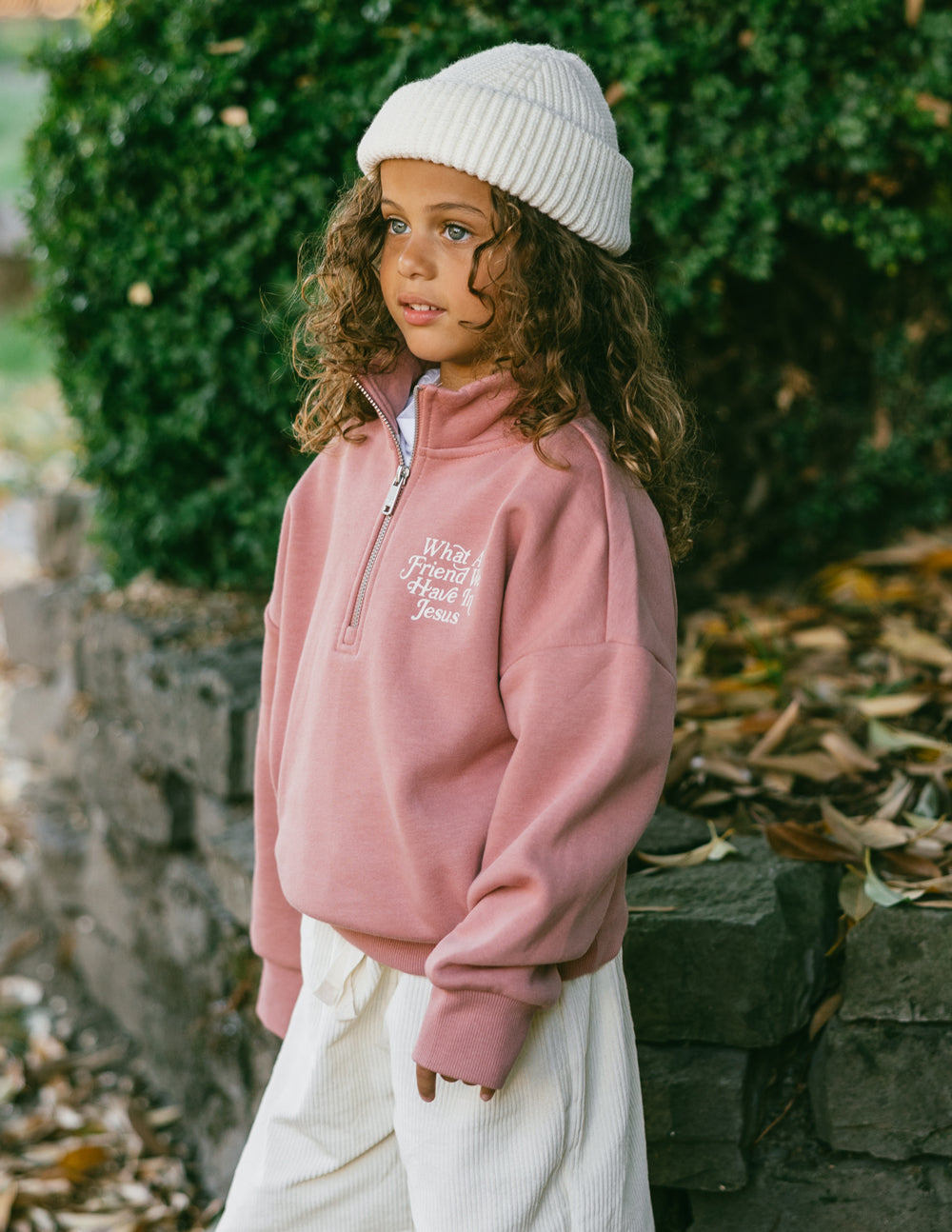 Kids mauve half-zip sweatshirt with long sleeves and embroidered front logo