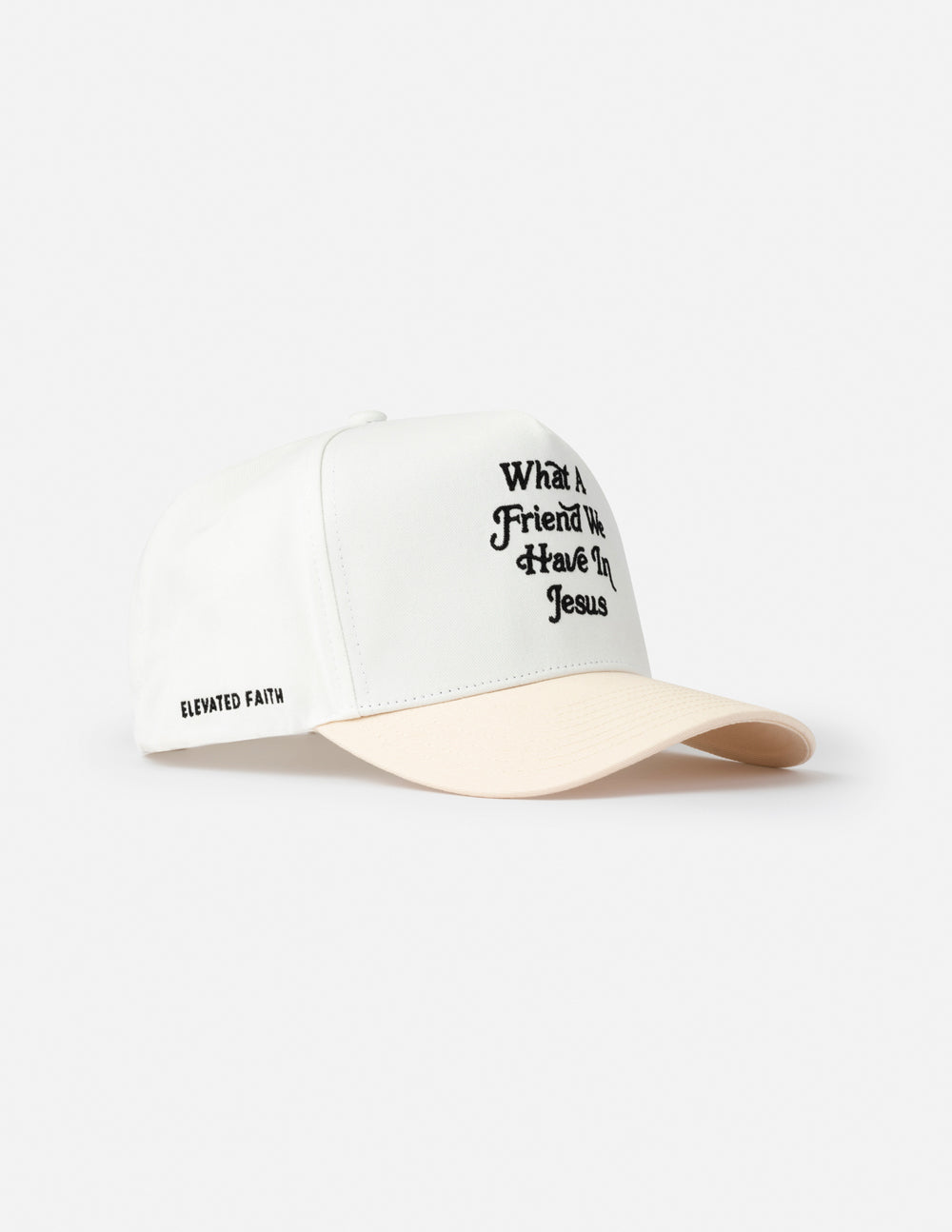 White trucker hat with beige brim and embroidered religious text on front