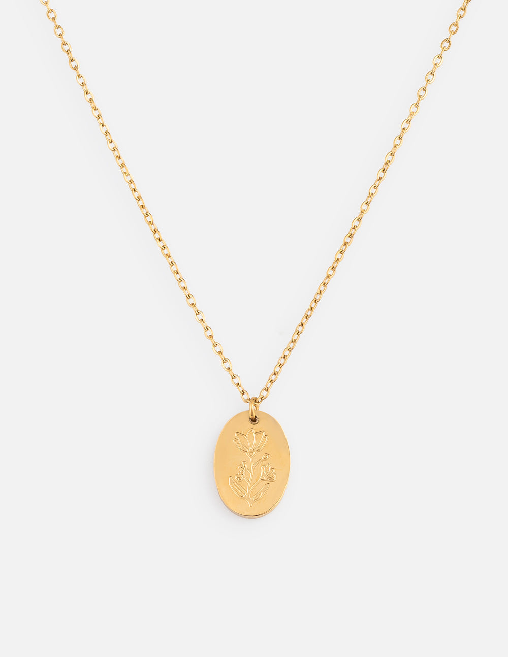 Gold-tone oval link necklace with engraved floral pendant and chain