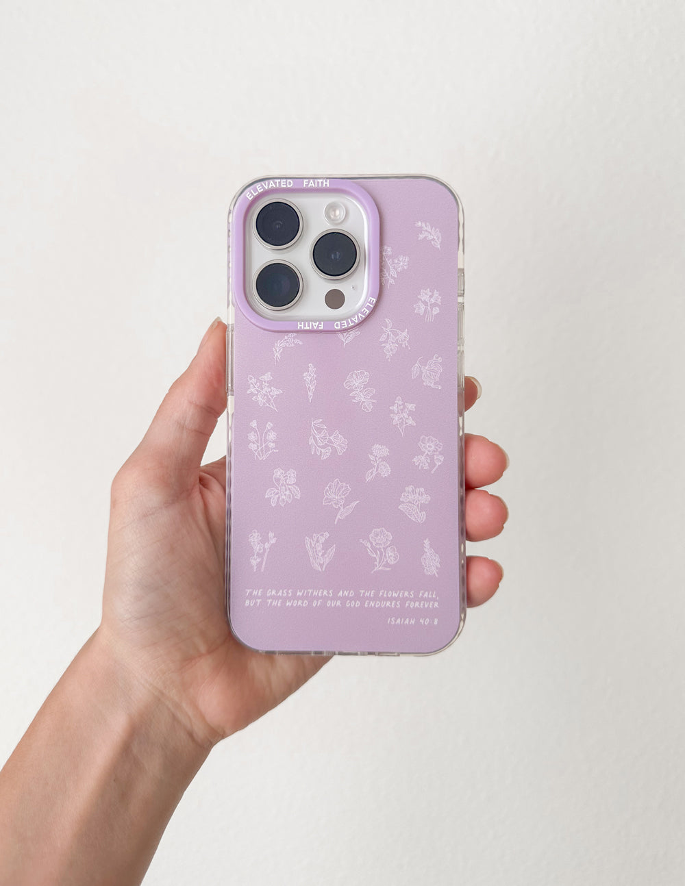 Lavender phone case with white floral pattern and camera lens cutouts