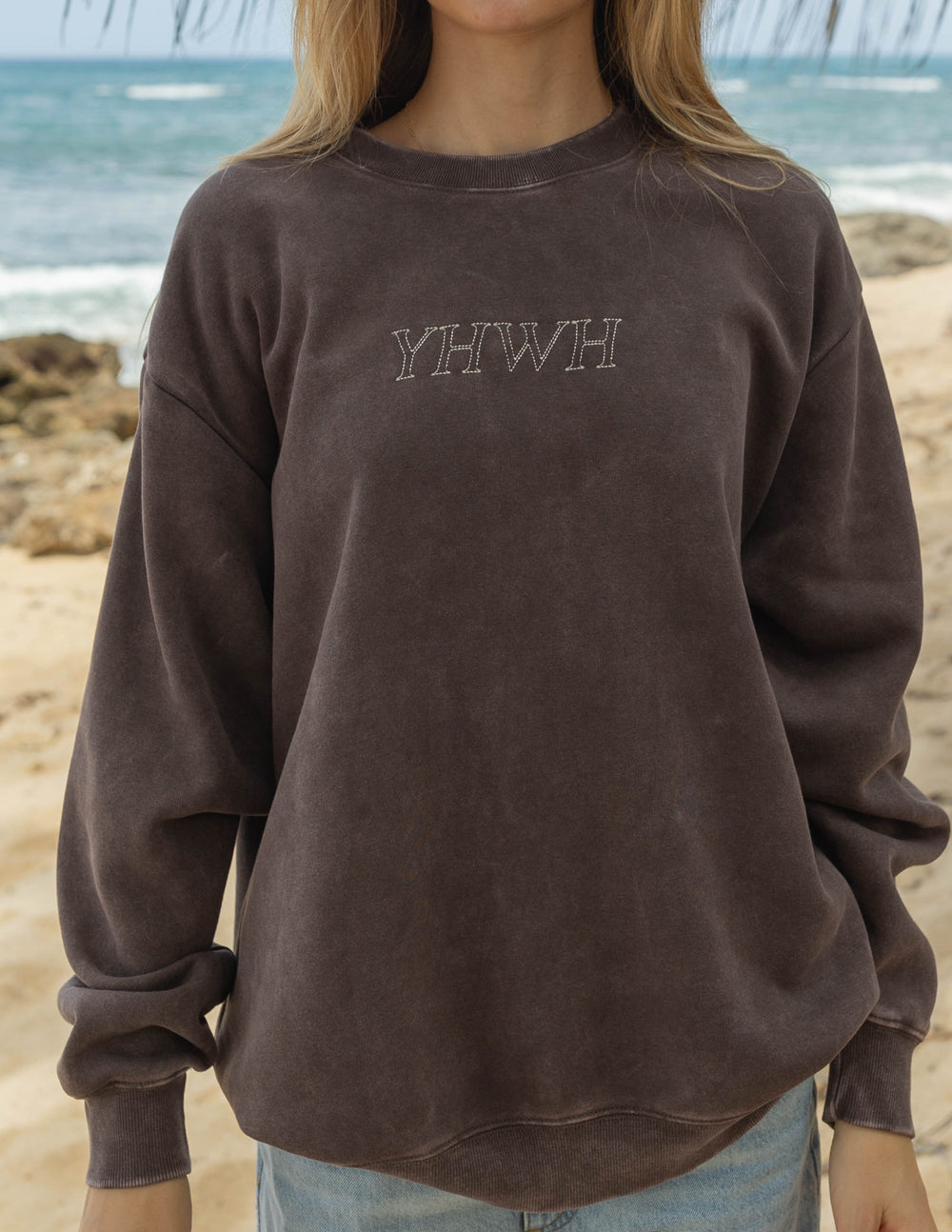 Unisex crewneck sweatshirt, dark brown, YHWH logo across chest, ribbed hem