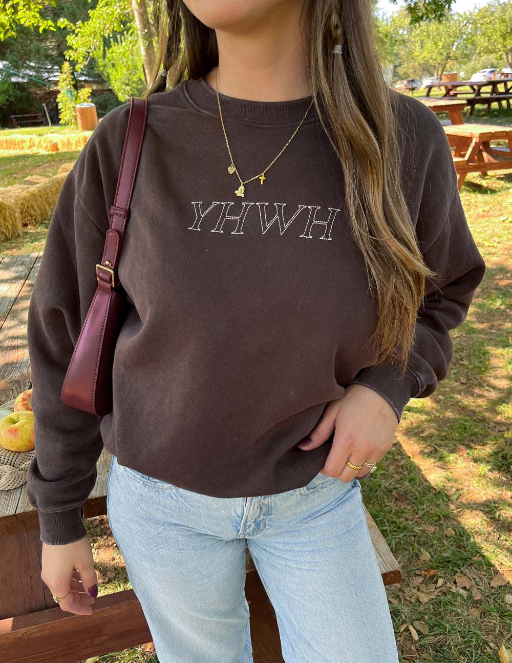 Unisex crewneck sweatshirt, dark brown, YHWH logo on front, crew neckline