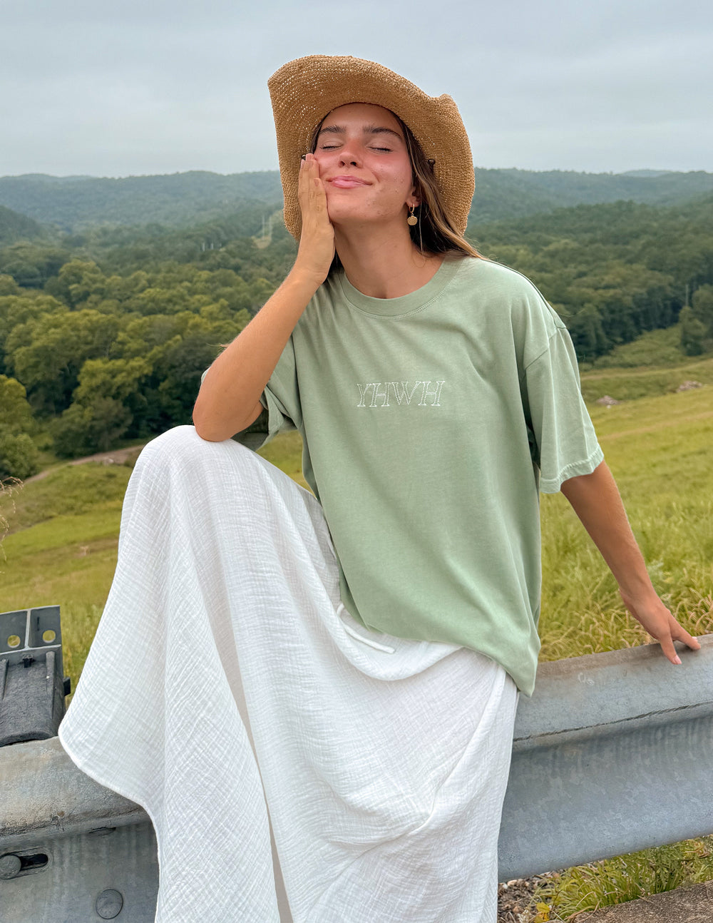Unisex sage green T-shirt, crew neck, small chest YHWH logo.