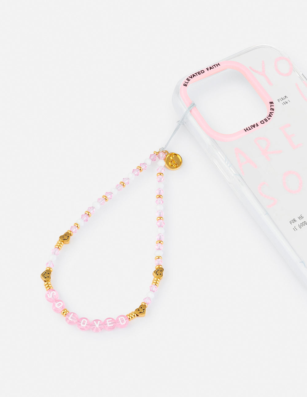 Pink and gold beaded phone charm with round gold accent and hanging loop