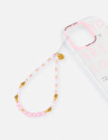 Pink and gold beaded phone charm with round gold accent and hanging loop