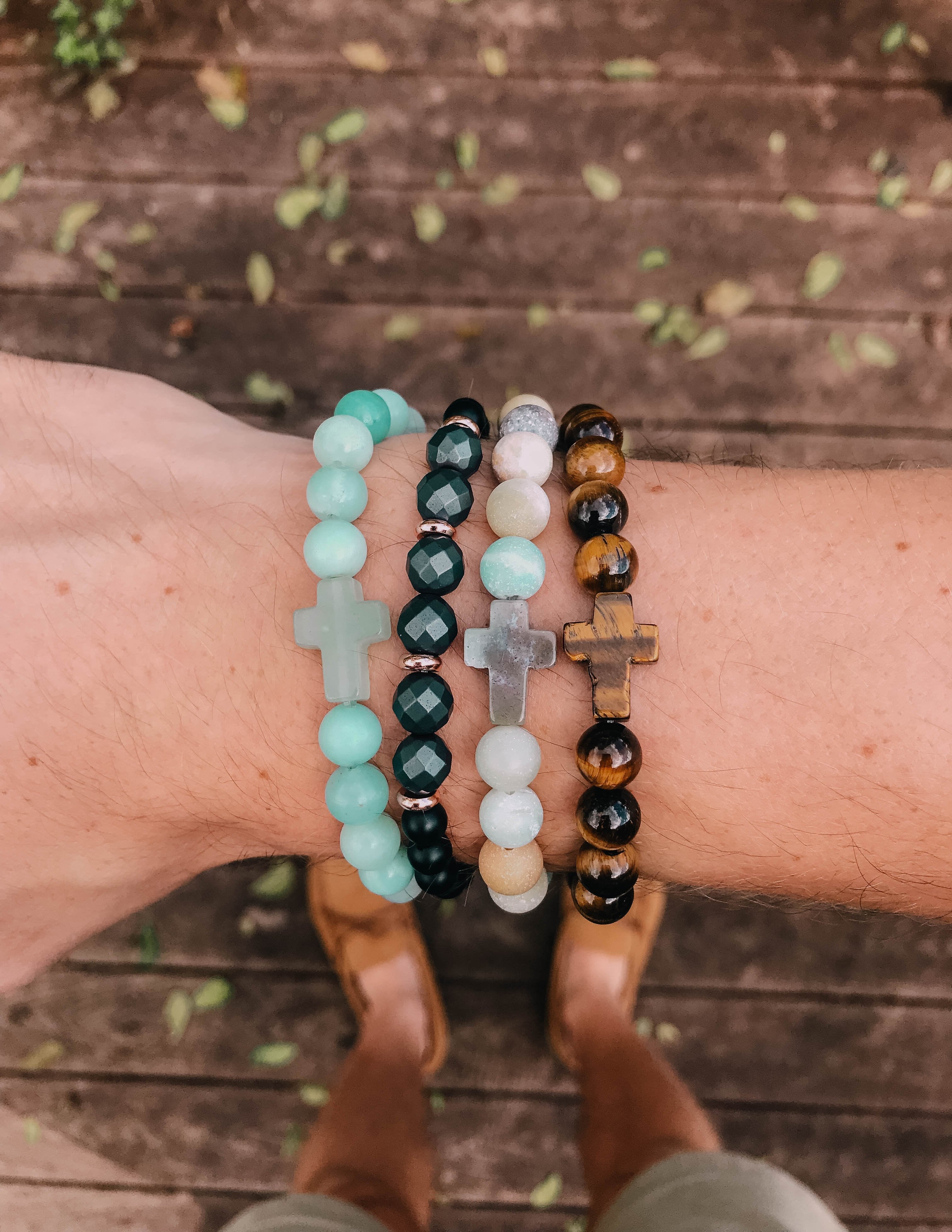 Amazonite cross bracelet with light blue beads and a small silver-tone cross charm