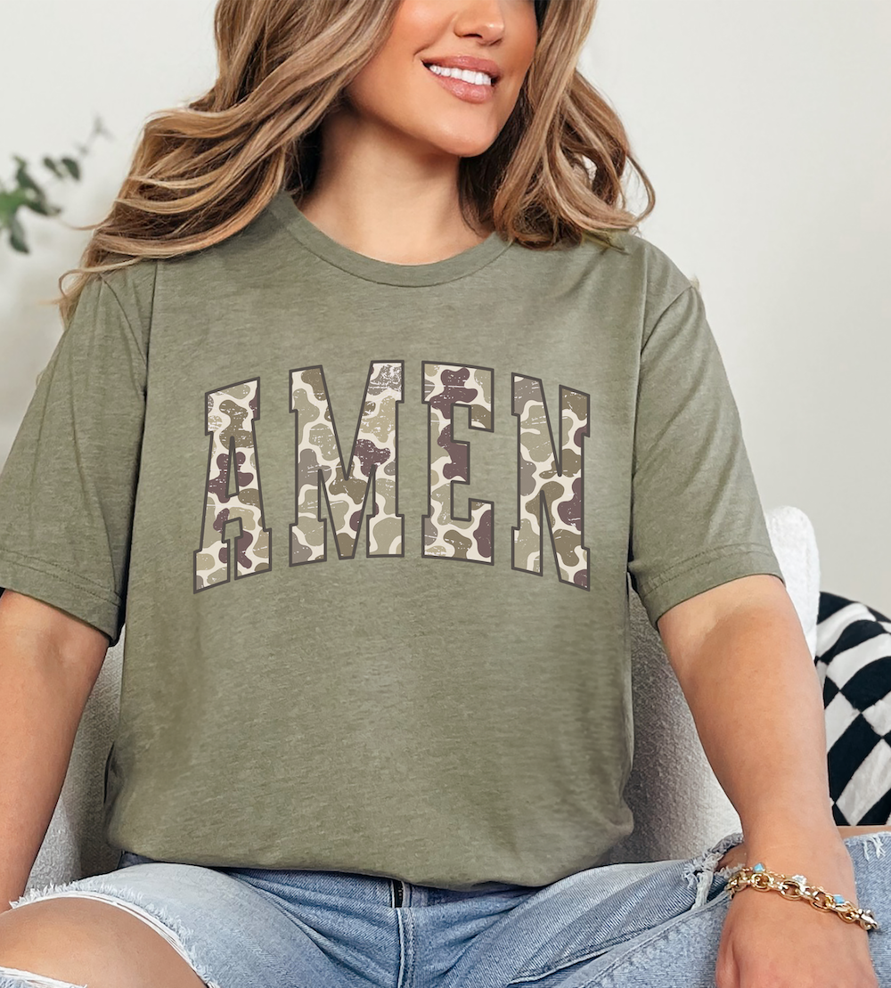 Olive camo graphic T-shirt with large AME N lettering on front