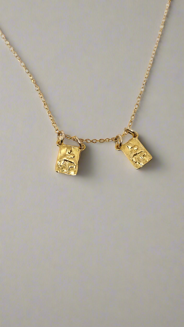 Gold vermeil scapular necklace with two rectangular pendant charms on a gold chain